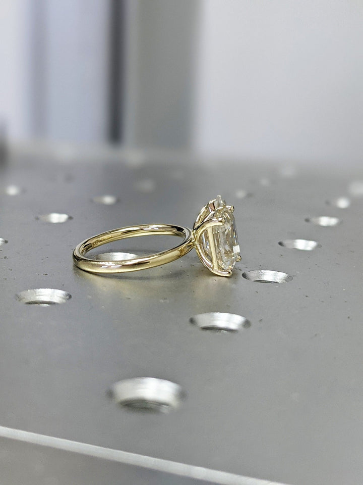 Detailed close-up of pear solitaire diamond engagement ring