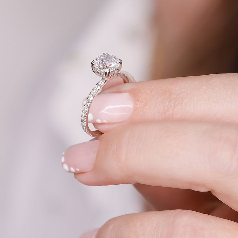Round hidden halo engagement ring with brilliant diamond sparkle