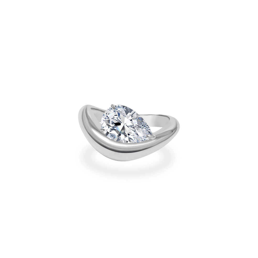 Pear dome diamond ring presented in signature gift packaging