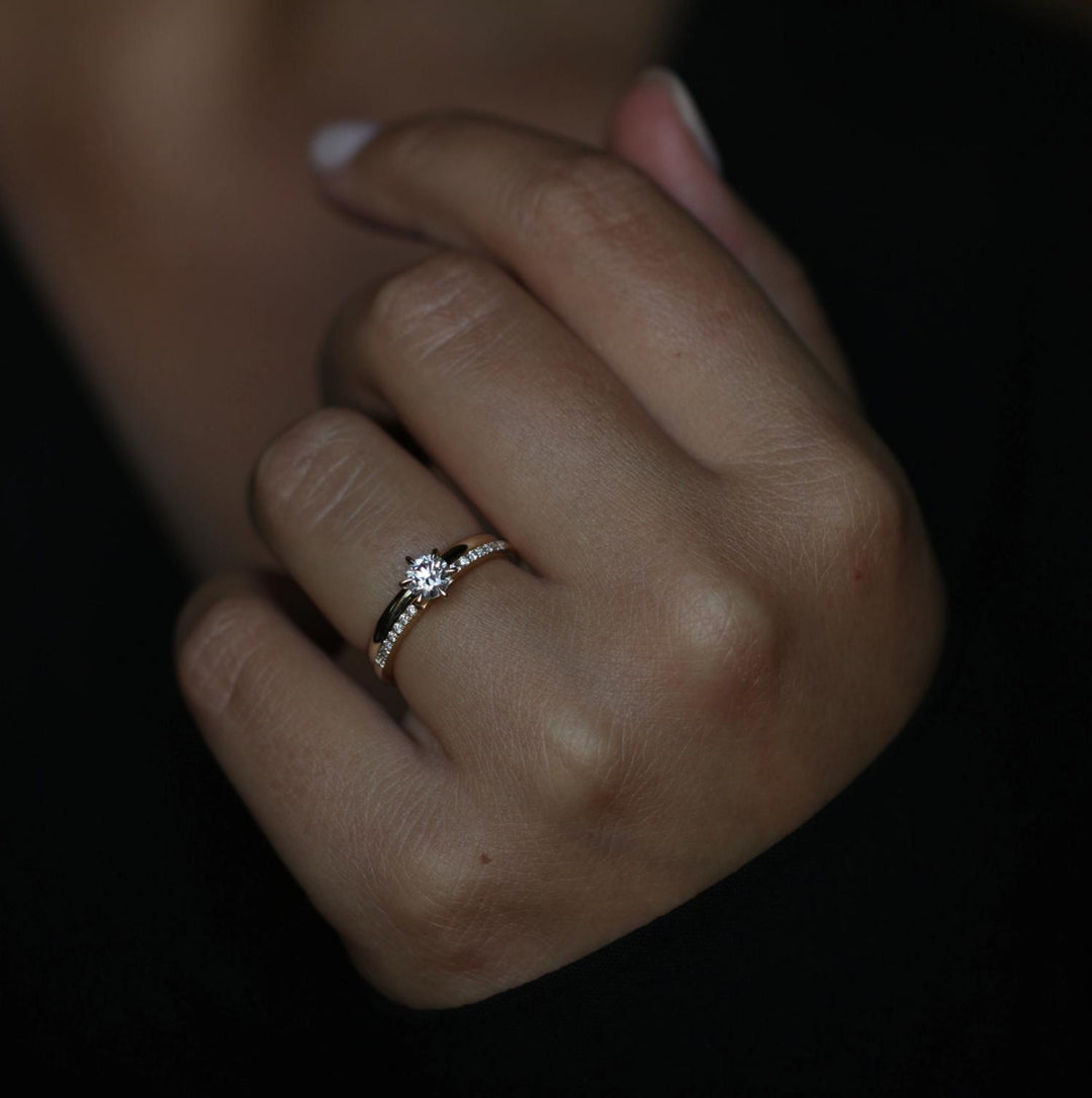 Round solitaire engagement ring with brilliant diamond sparkle