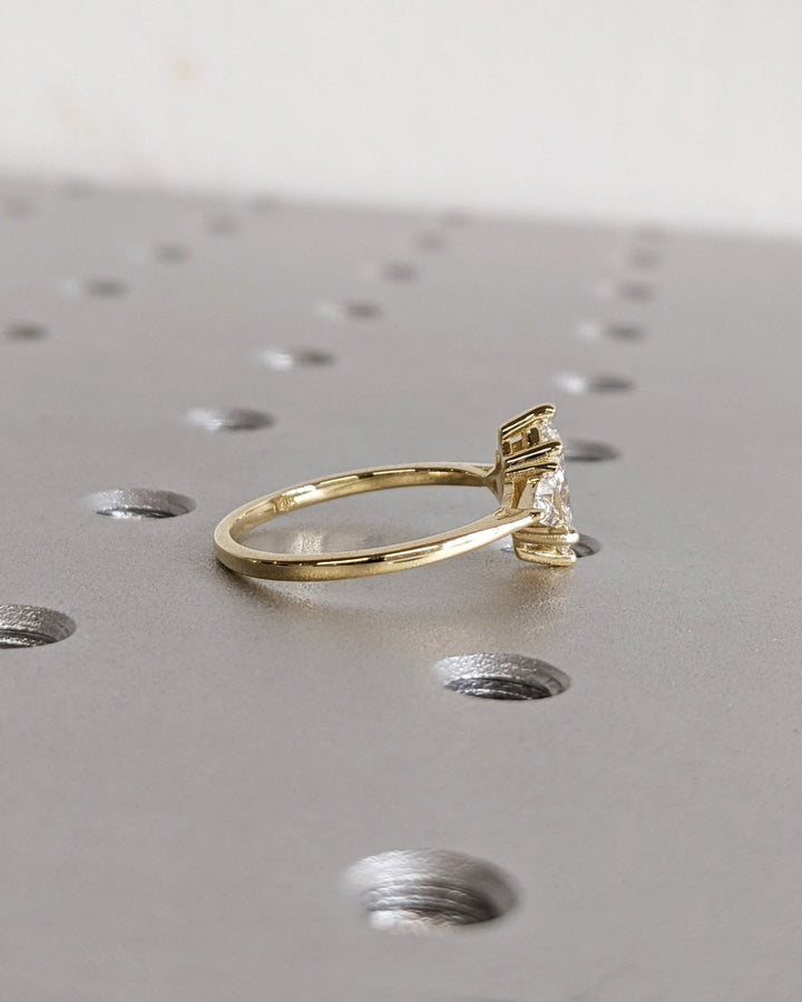 Side angle of marquise solitaire diamond engagement ring