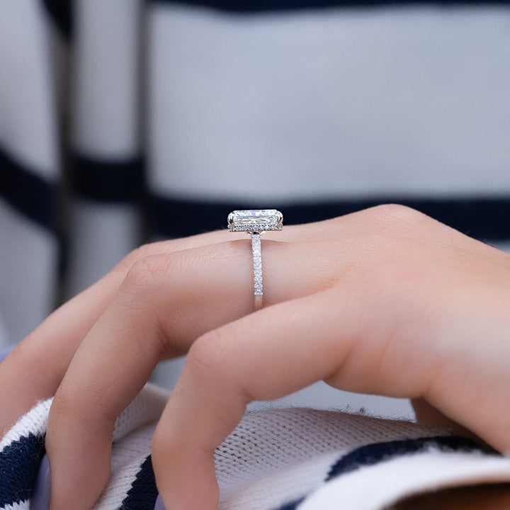 Radiant hidden halo diamond engagement ring available in multiple metals