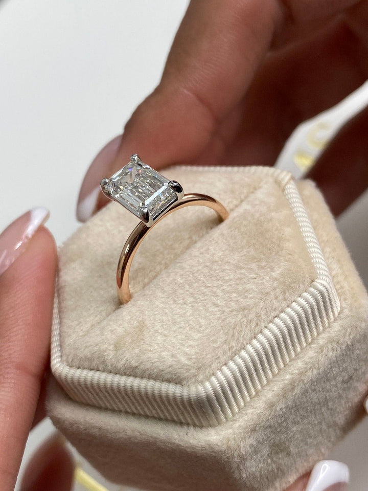 Premium emerald cut solitaire engagement ring crafted in solid gold