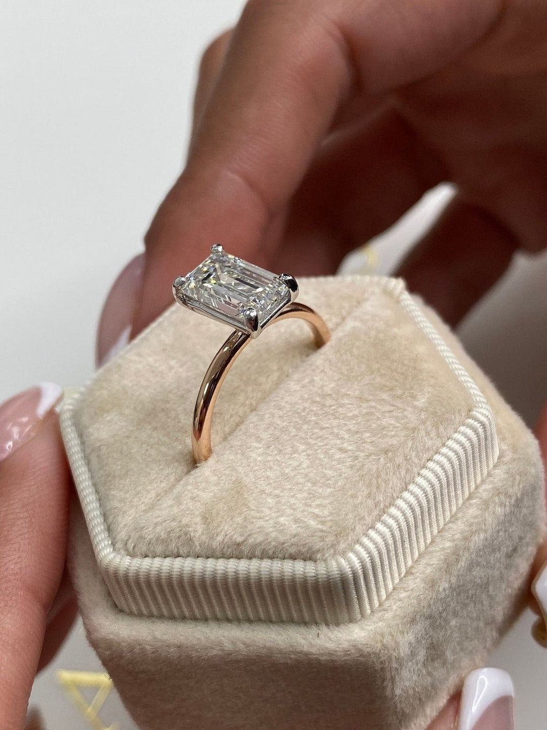 Emerald solitaire engagement ring with IGI certificate and packaging