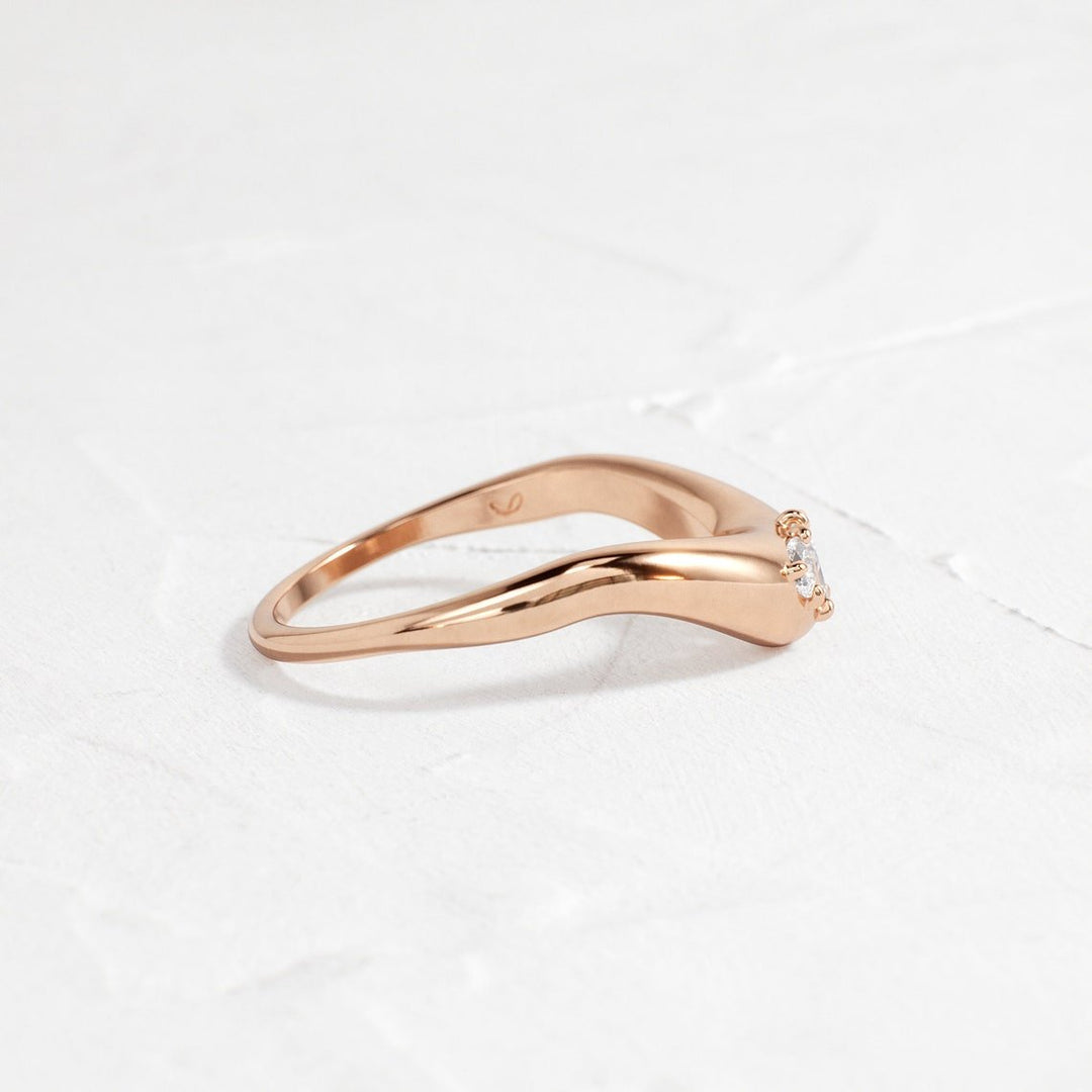 Ethically sourced pear diamond eternity band