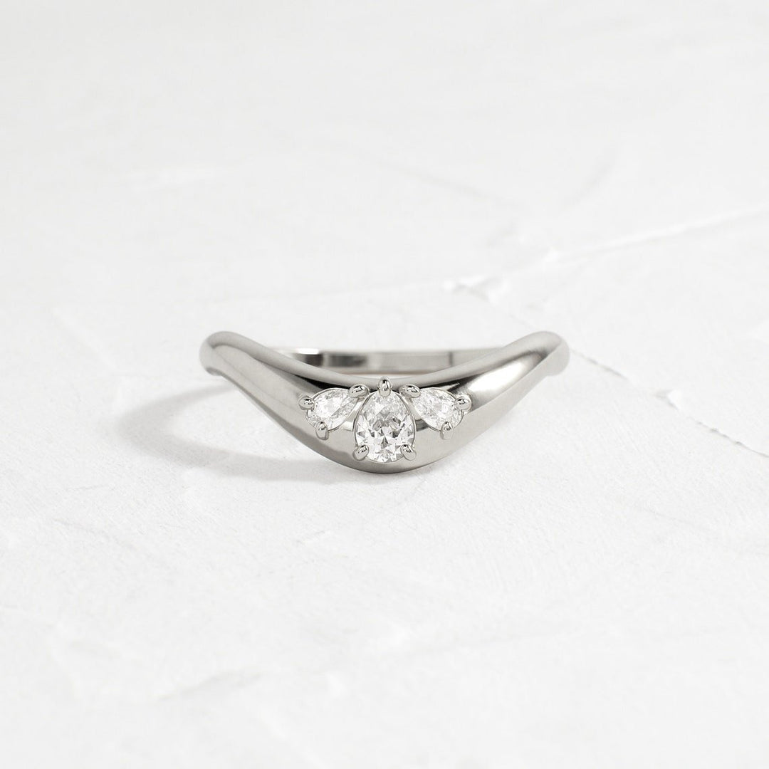 Pear diamond wedding band in yellow gold