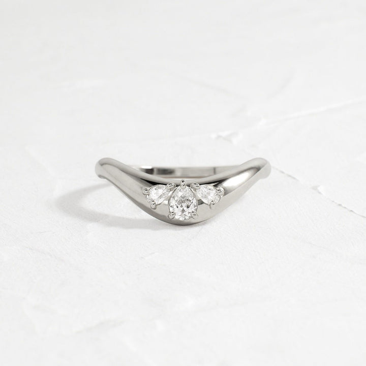 Pear diamond wedding band in yellow gold
