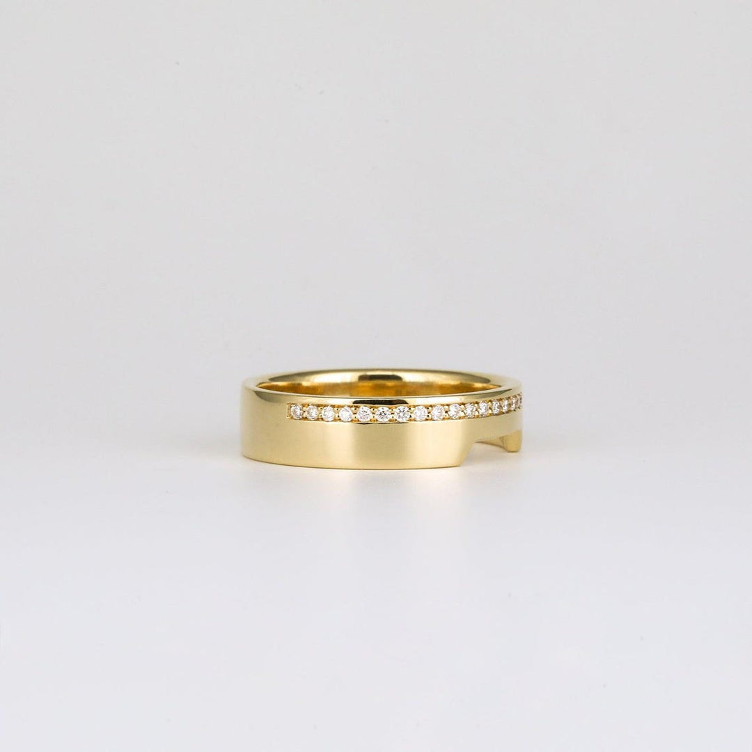 Round diamond band stacked with engagement ring
