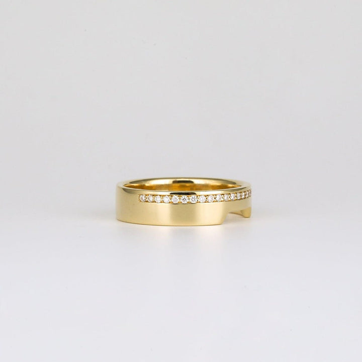 Round diamond band stacked with engagement ring