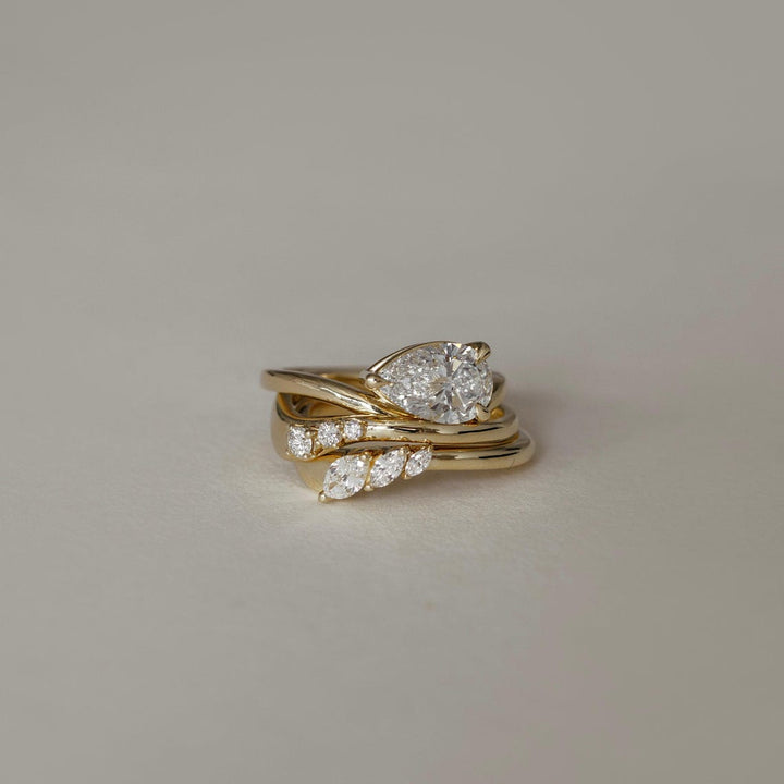 Round diamond wedding band in rose gold