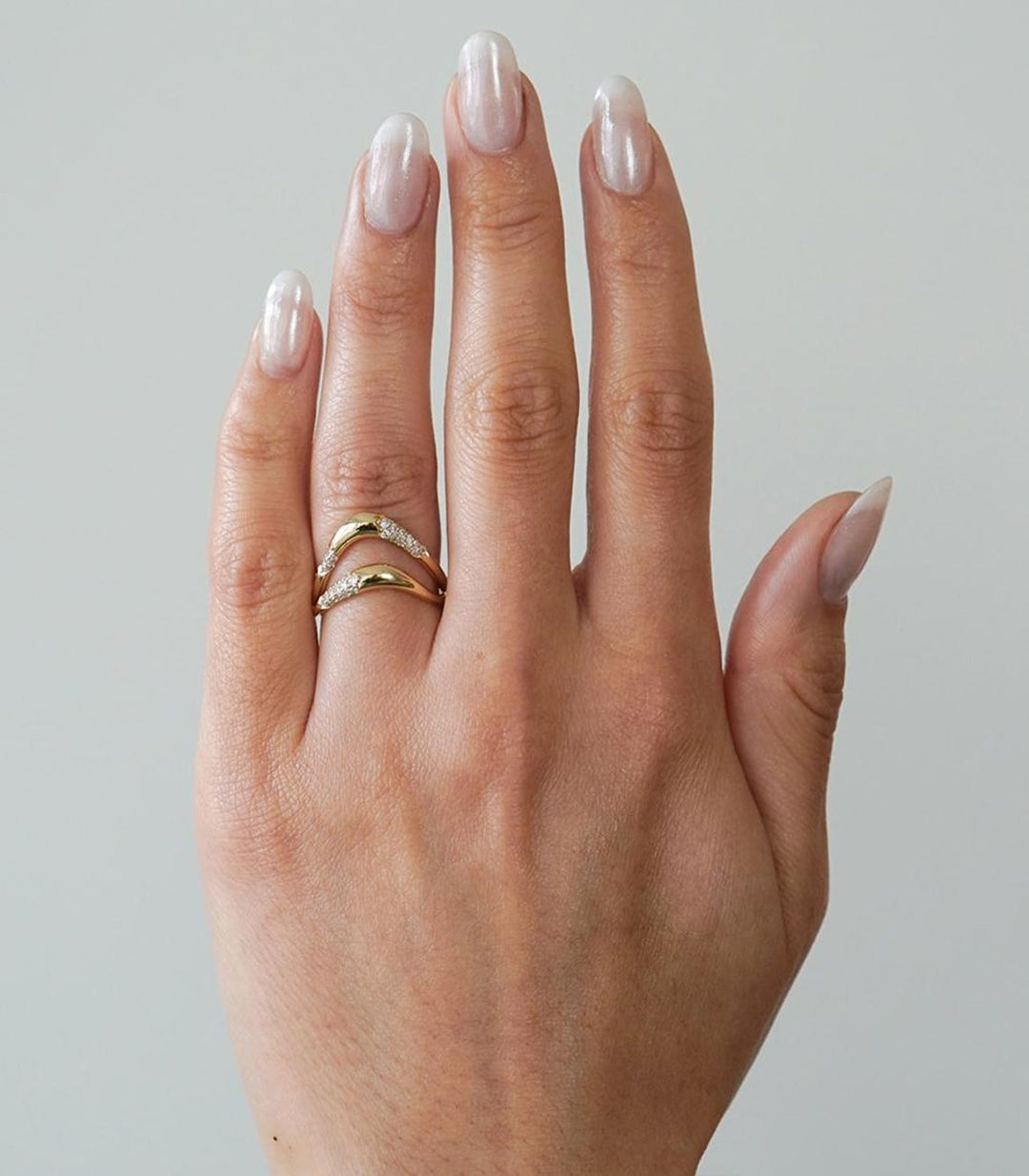 Round diamond band stacked with engagement ring