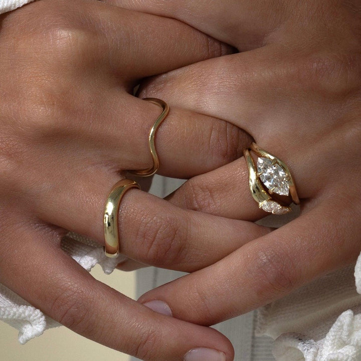 Marquise diamond wedding band in rose gold