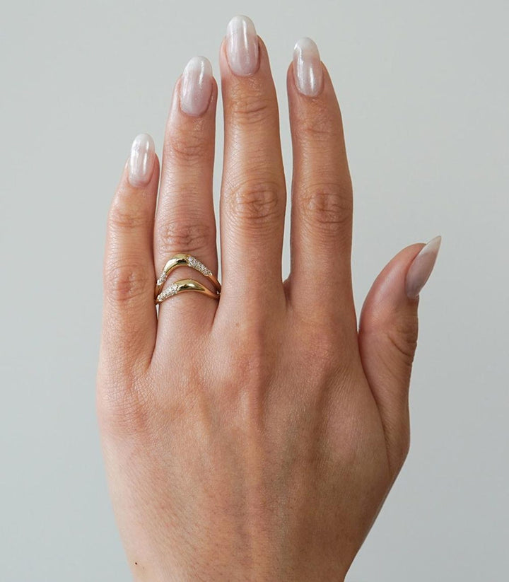 Round diamond band stacked with engagement ring