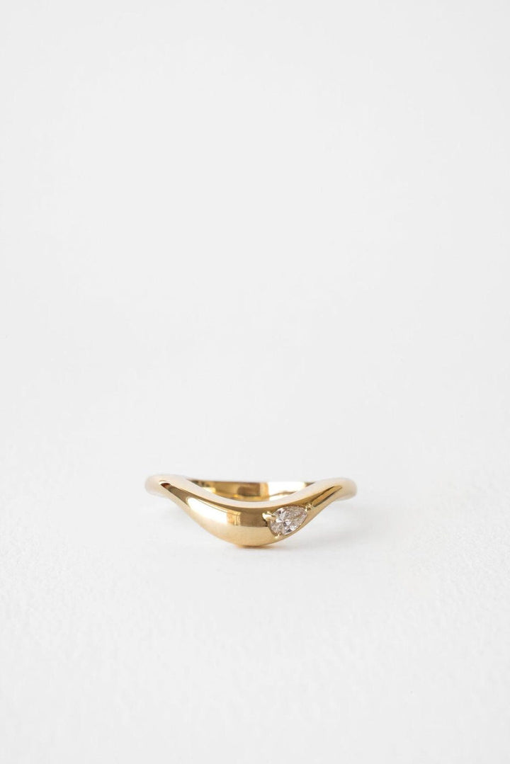 Pear diamond wedding band in yellow gold