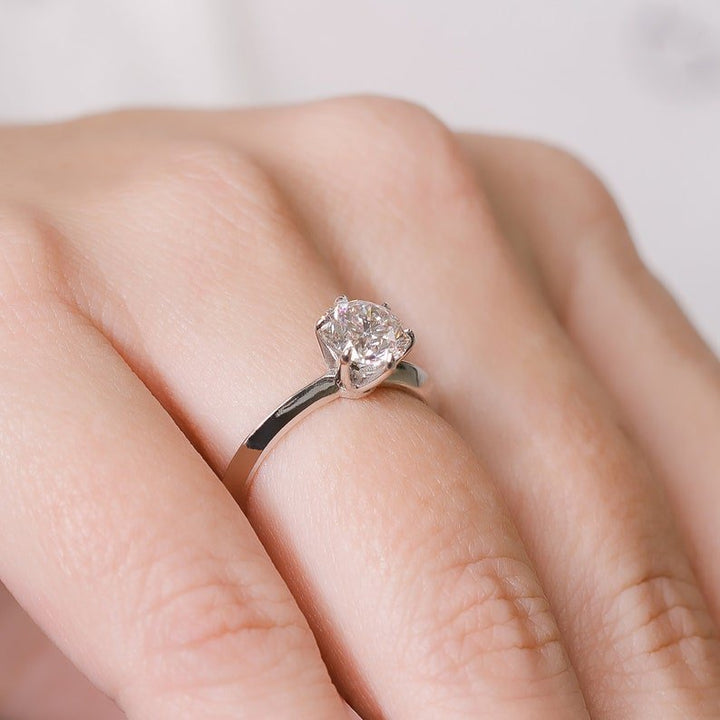 Angled view of round cut diamond in solitaire setting