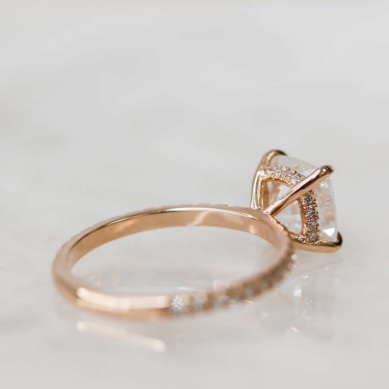 Cushion solitaire diamond engagement ring available in multiple metals