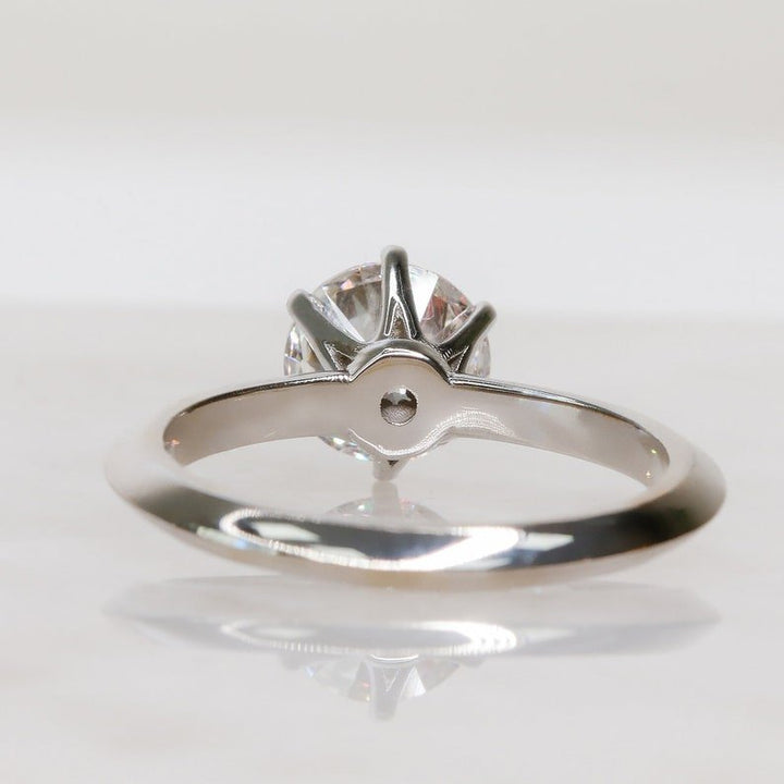 Top-down view of round cut solitaire engagement ring