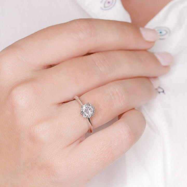 Round solitaire engagement ring with brilliant diamond sparkle