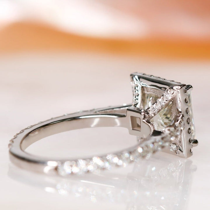 Unboxing view of princess cut halo diamond engagement ring