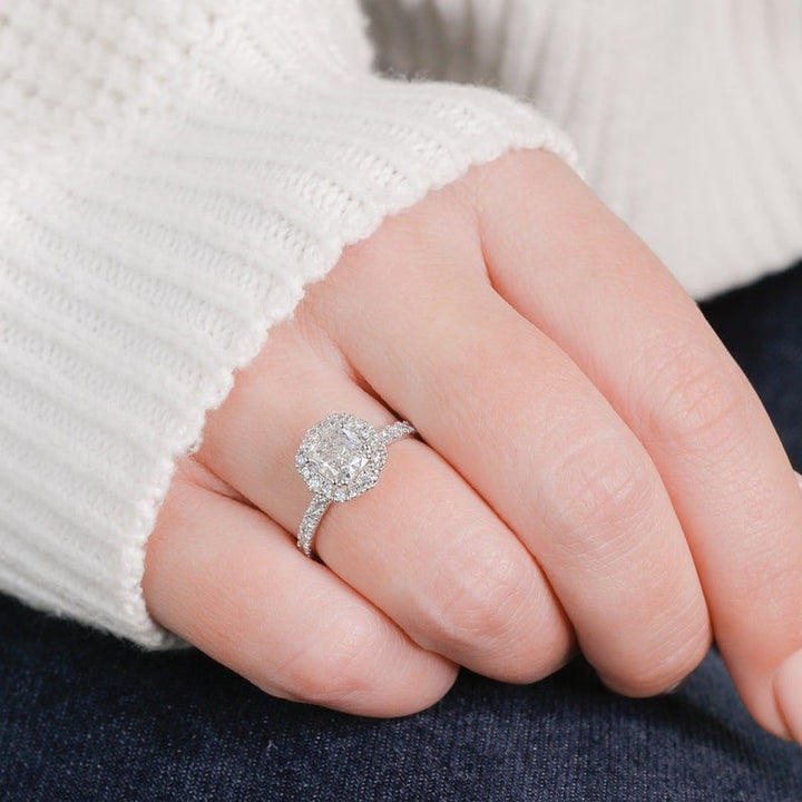 Cushion cut engagement ring side view showing band detail