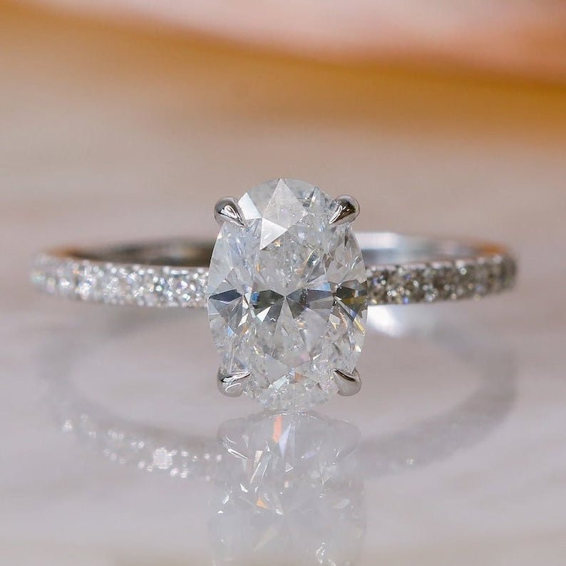 Shop oval hidden halo lab grown diamond engagement ring