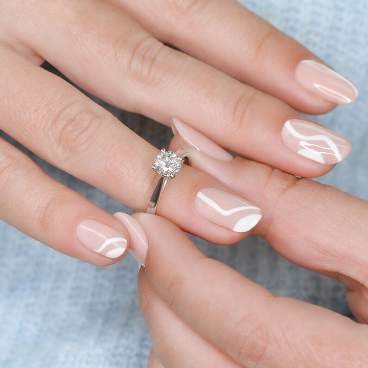 Round solitaire lab grown diamond ring in jewelry gift box