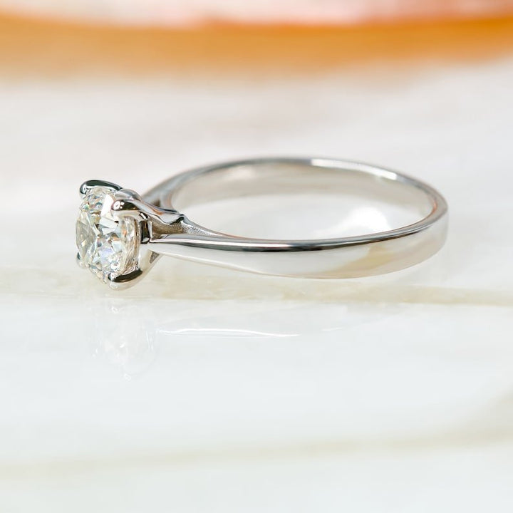 Unboxing view of round cut solitaire diamond engagement ring