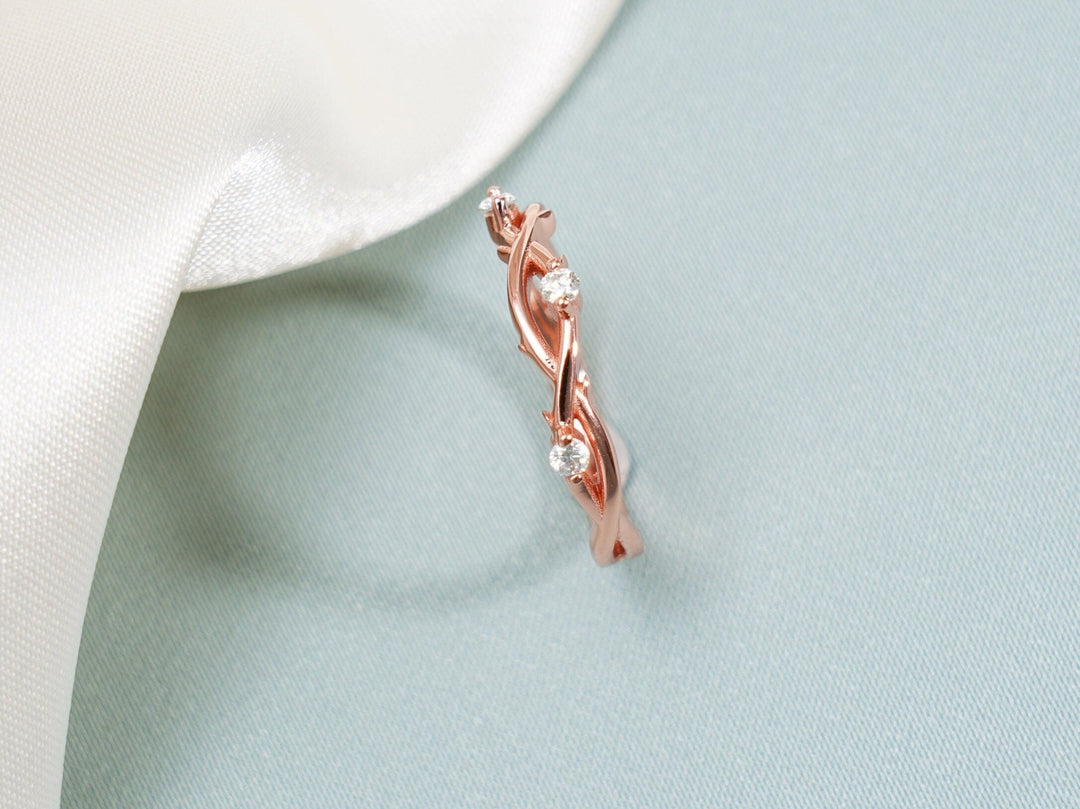 Side view of round diamond wedding band