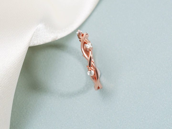 Side view of round diamond wedding band