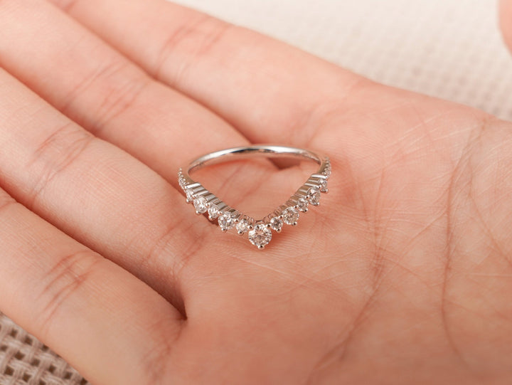 Round diamond band stacked with engagement ring