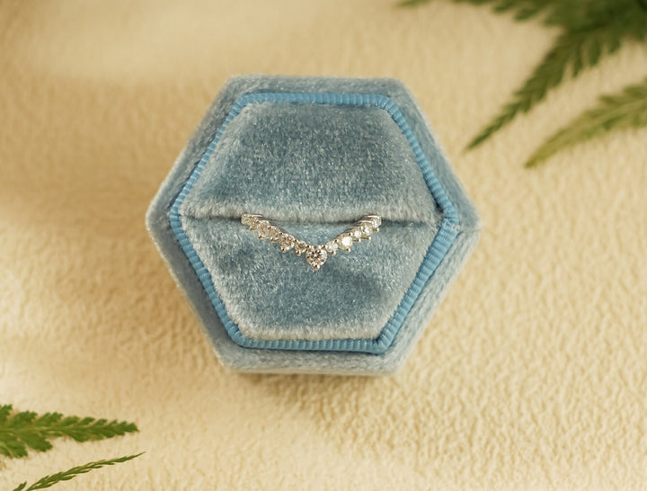 Side view of round diamond wedding band