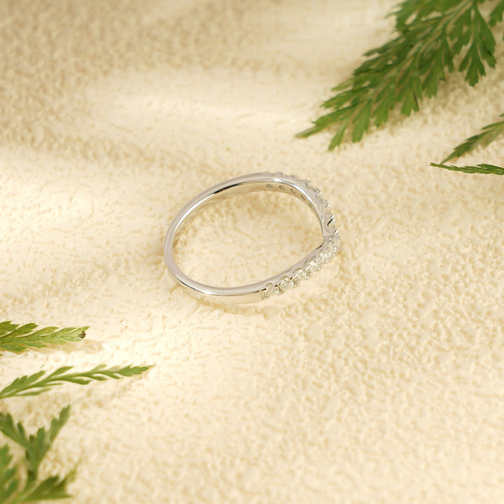 Round diamond band stacked with engagement ring