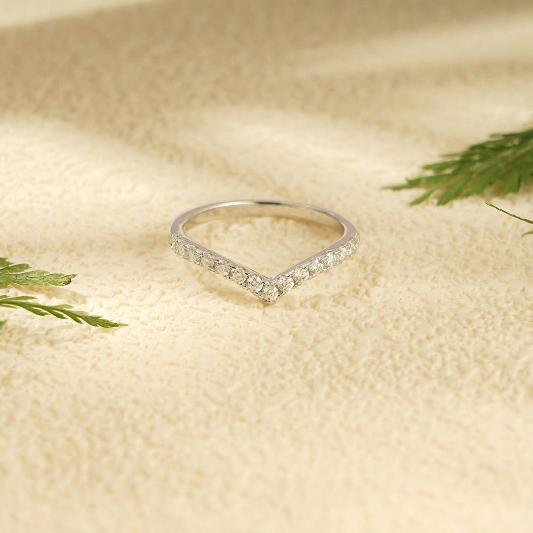 Side view of round diamond wedding band