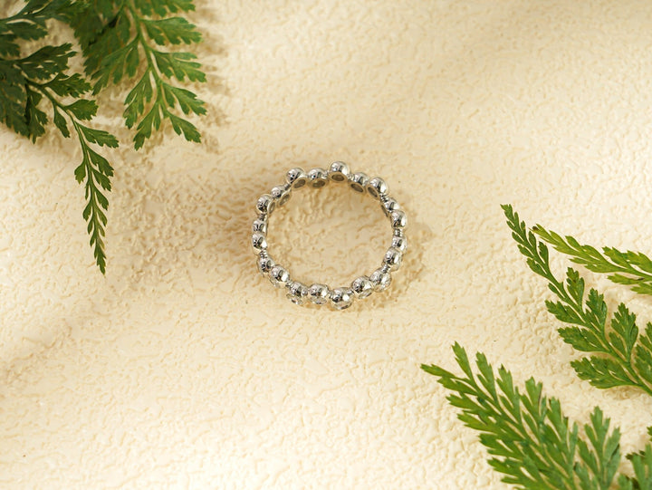 Round lab grown diamond band worn on hand