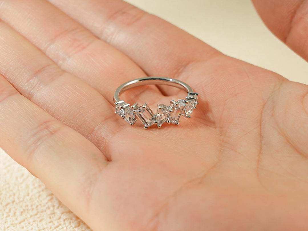 Side view of multi stone diamond wedding band