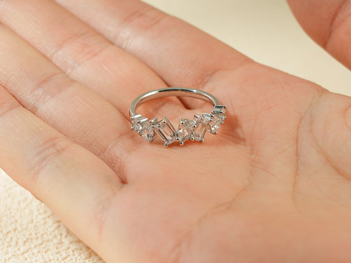 Side view of multi stone diamond wedding band