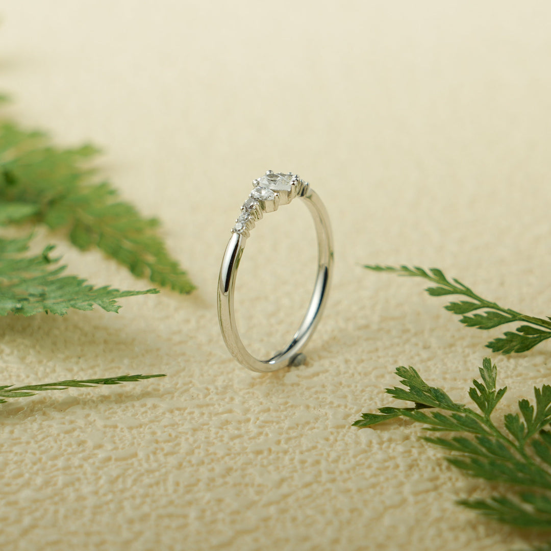 Ethically sourced pear & round diamond eternity band