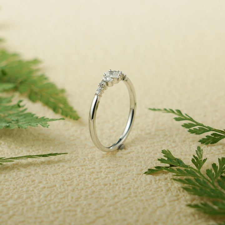 Ethically sourced pear & round diamond eternity band