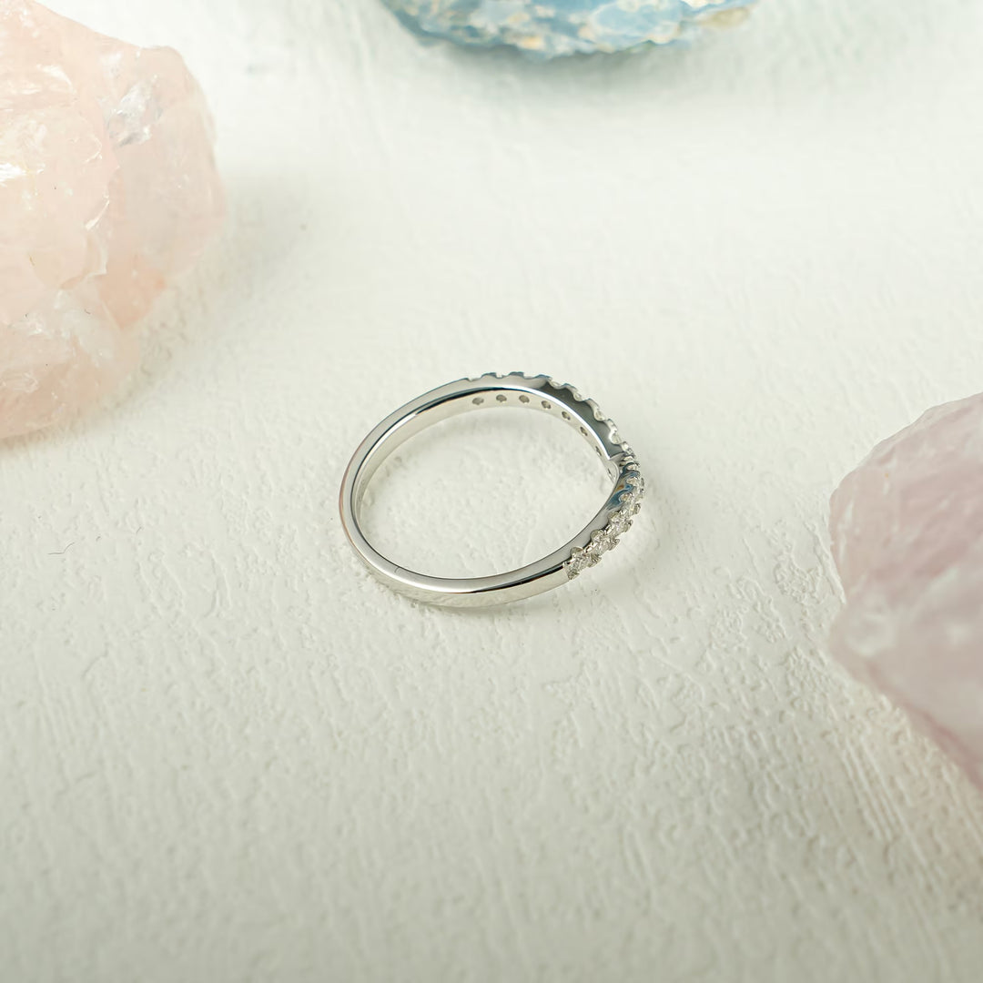Round diamond band stacked with engagement ring