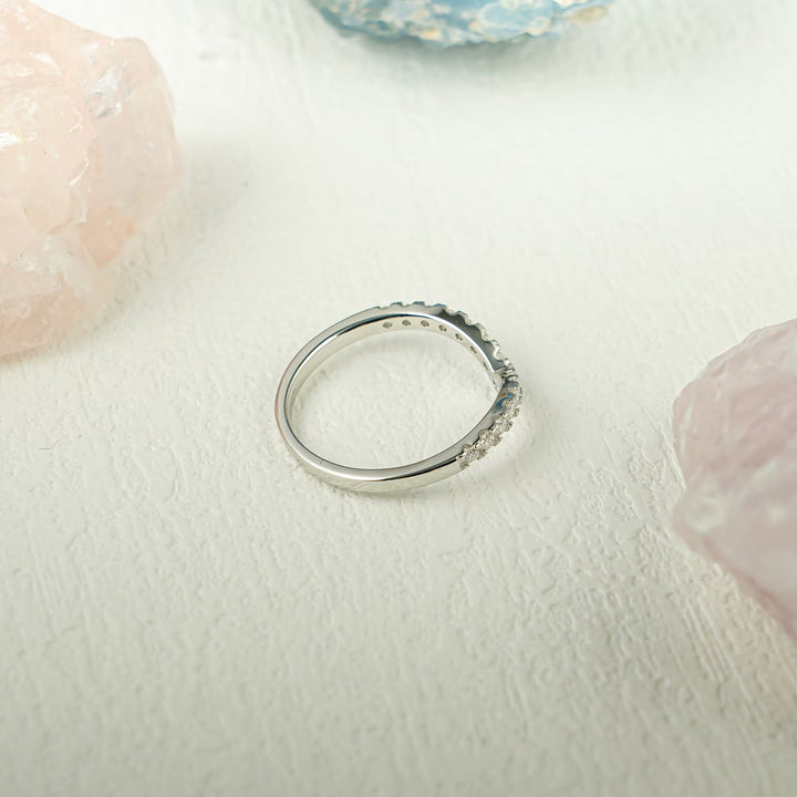 Round diamond band stacked with engagement ring