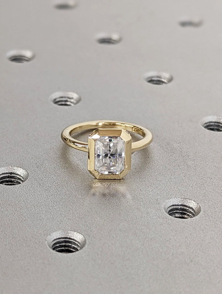 Top-down view of radiant cut hidden halo engagement ring