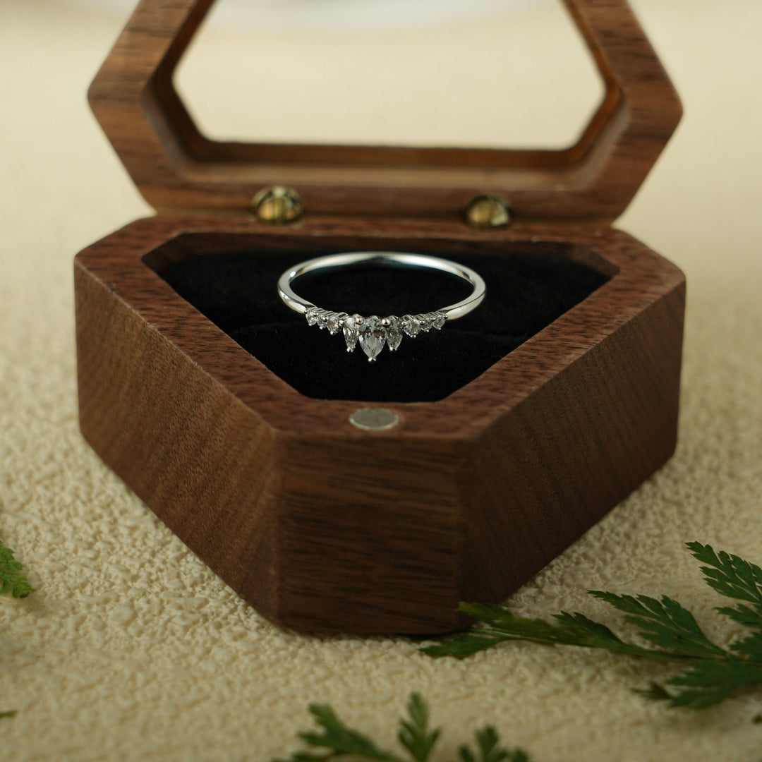 Sustainable pear & round diamond wedding ring