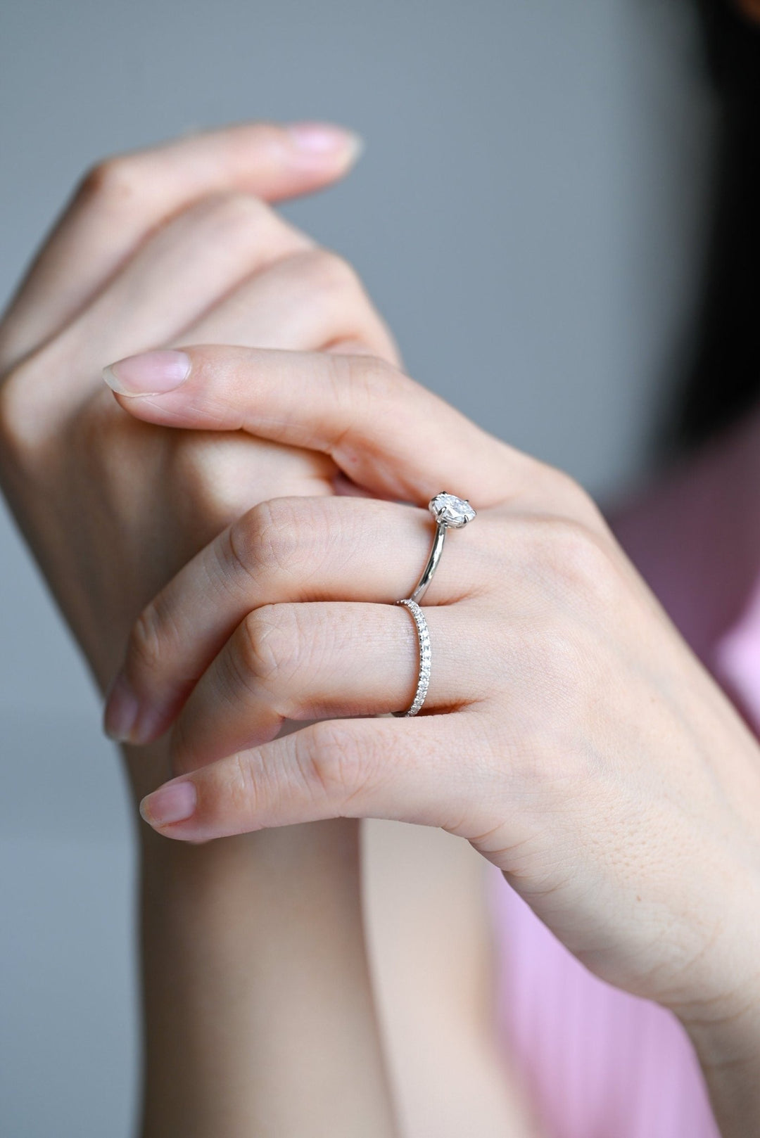 Round diamond band stacked with engagement ring