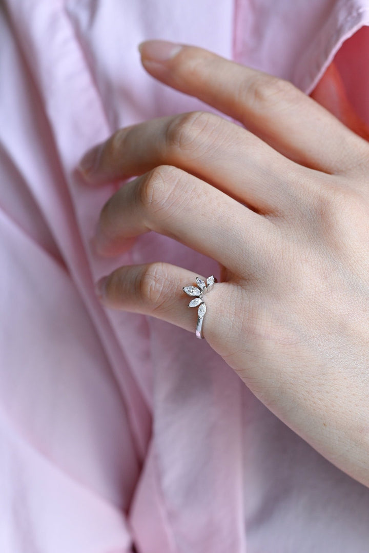 Side view of marquise diamond wedding band