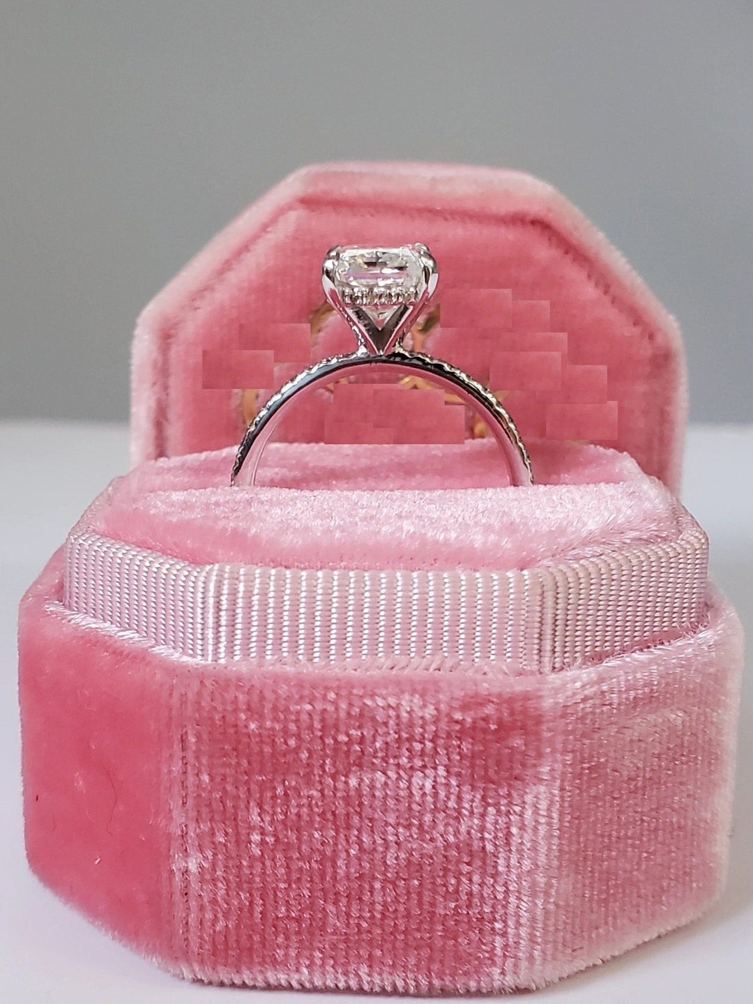 IGI certified radiant cut diamond in hidden halo engagement ring setting