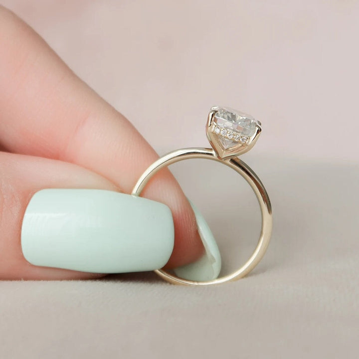 Cushion hidden halo lab grown diamond ring fitted on finger