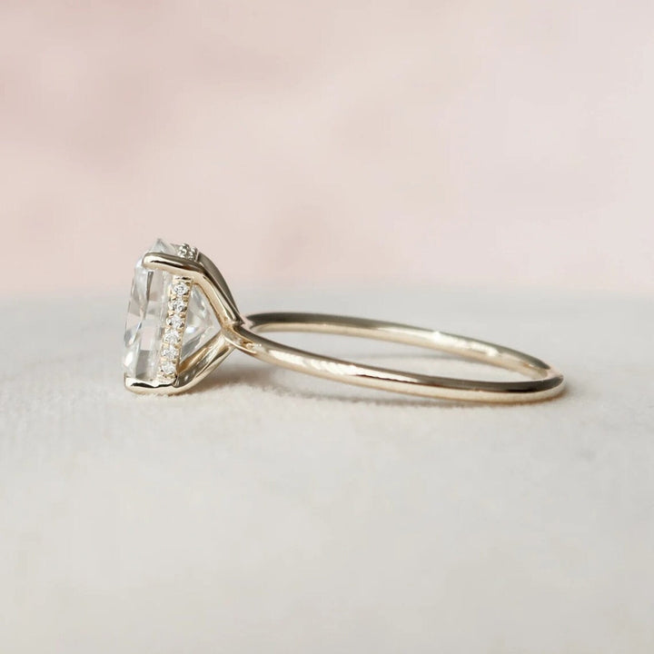 Cushion cut hidden halo engagement ring shown in real-life wear