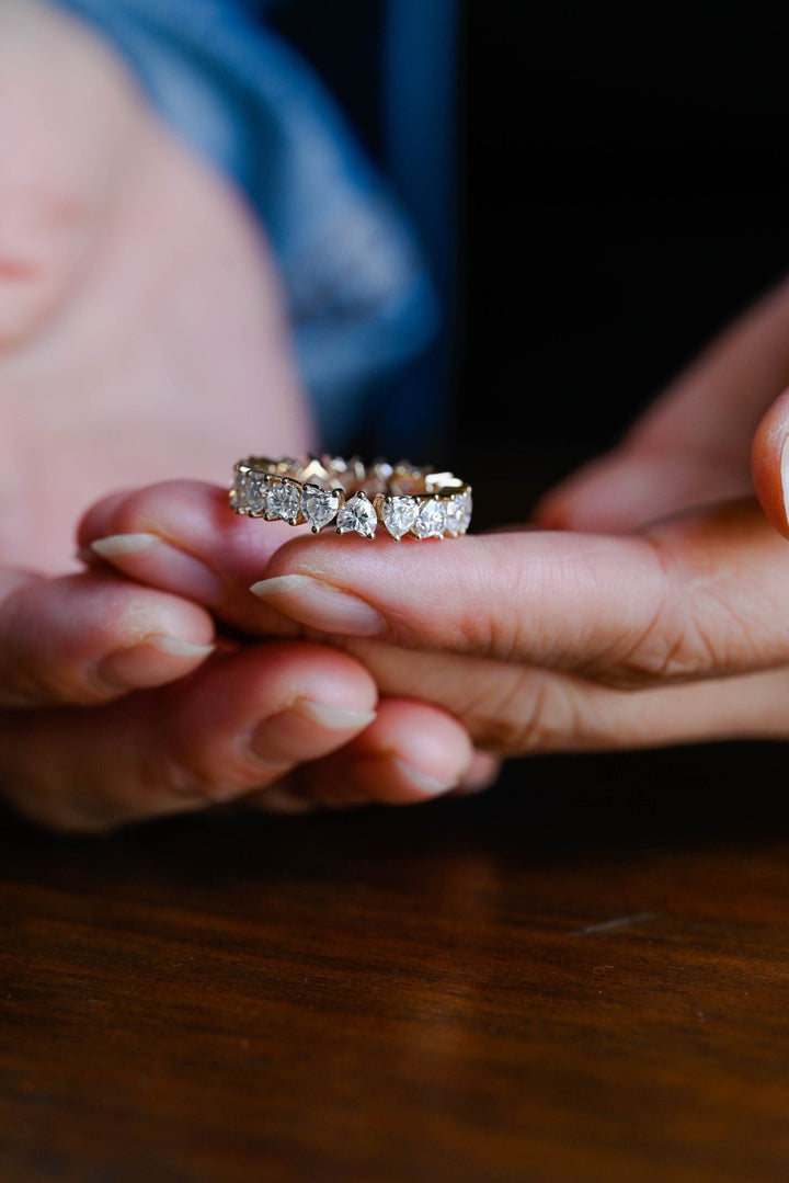 Heart diamond band stacked with engagement ring