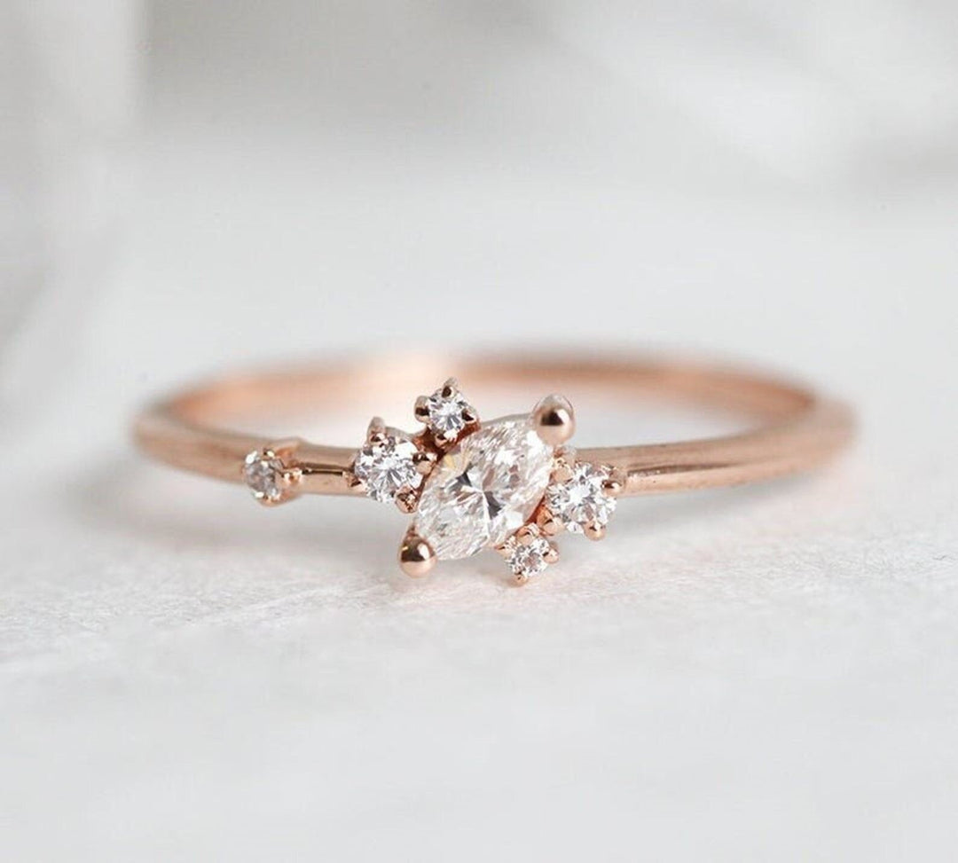 Marquise cut diamond ring worn on hand