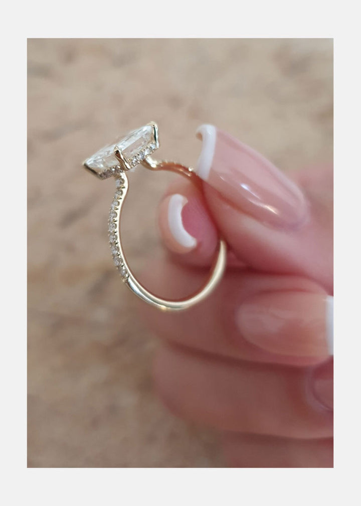 Princess pave engagement ring viewed from the side